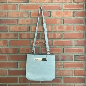 Chens gray gator crossbody leather style name is balenciaga on website 11”x10”